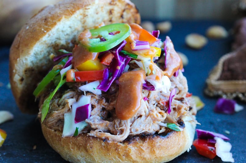 Slow Cooker Peanut BBQ Pulled Pork Sandwiches with Thai Ginger Slaw | dishingouthealth.com