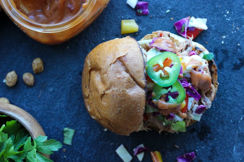 Slow Cooker Peanut BBQ Pulled Pork Sandwiches with Thai Ginger Slaw | dishingouthealth.com