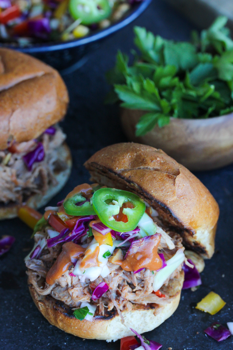 Slow Cooker Peanut BBQ Pulled Pork Sandwiches with Thai Ginger Slaw | dishingouthealth.com