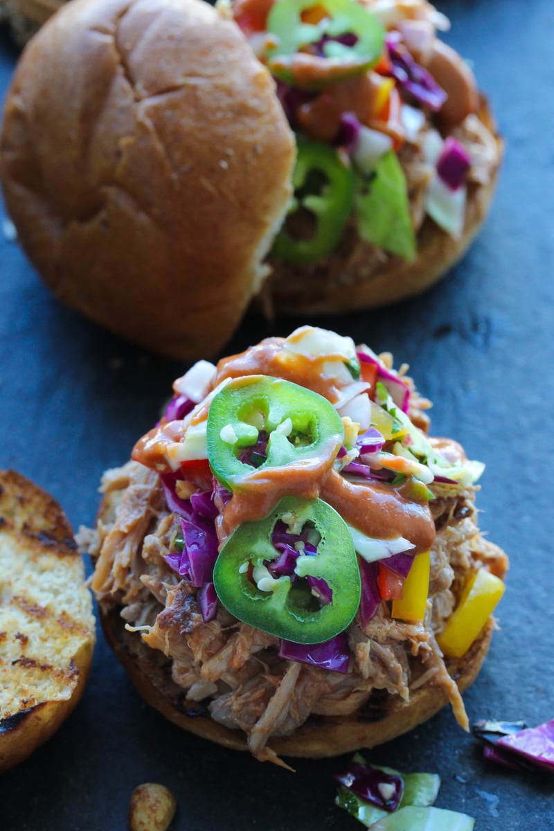 Slow Cooker Peanut BBQ Pulled Pork Sandwiches with Thai Ginger Slaw | dishingouthealth.com