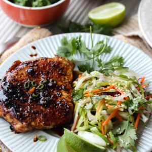Ginger-Soy Glazed Pork Chops with Asian Slaw | dishingouthealth.com