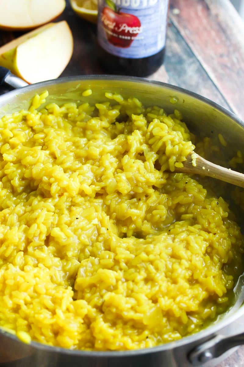 Cider Glazed Pork Medallions with Turmeric Risotto | dishingouthealth.com