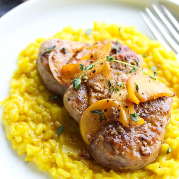 Cider Glazed Pork Medallions with Turmeric Risotto | dishingouthealth.com