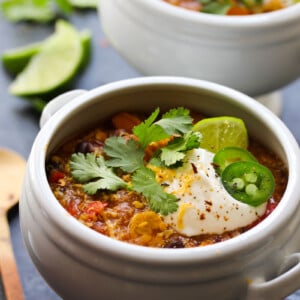 30 Minute Tempeh Enchilada Quinoa Soup | dishingouthealth.com