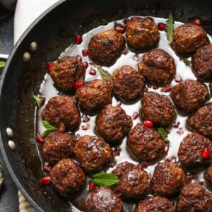 Beef and Bulgur Meatballs in Pomegranate Sauce | dishingouthealth.com