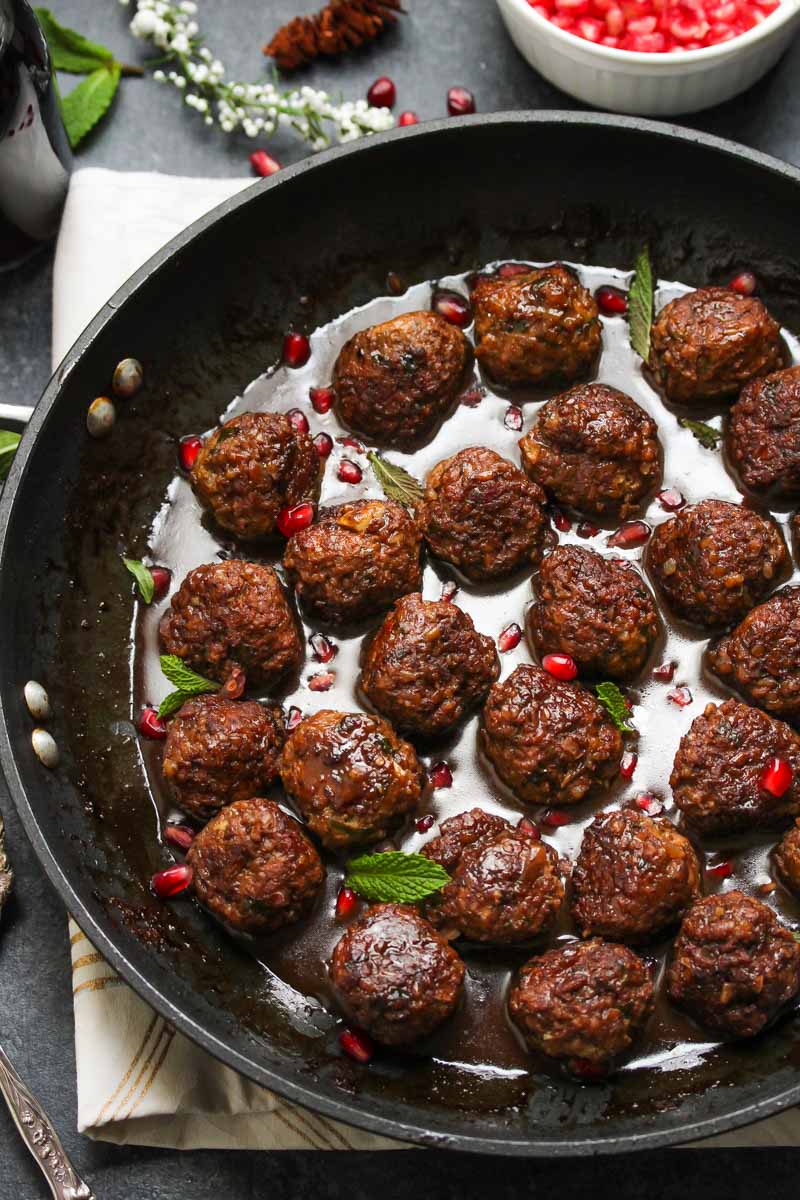 Beef and Bulgur Meatballs in Pomegranate Sauce | dishingouthealth.com