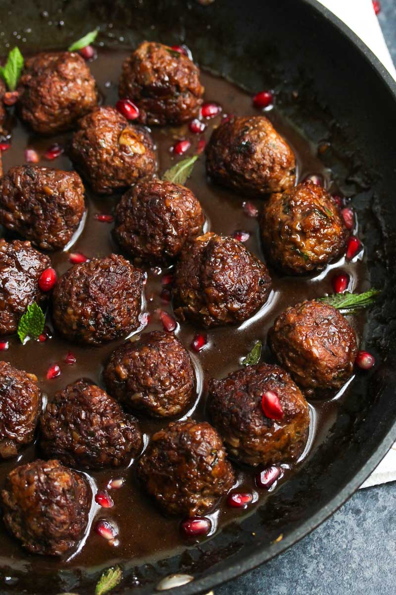 Beef and Bulgur Meatballs in Pomegranate Sauce | dishingouthealth.com