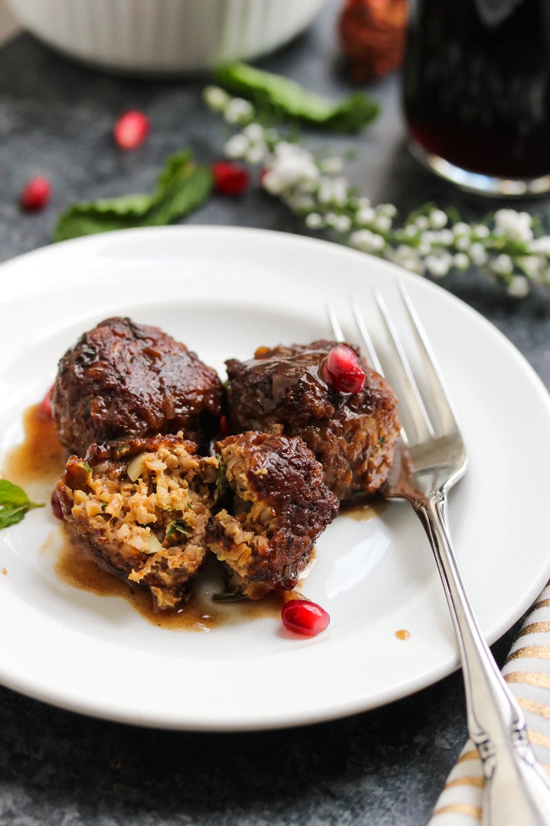 Beef and Bulgur Meatballs in Pomegranate Sauce | dishingouthealth.com