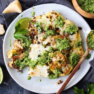 Roasted Cauliflower Steaks with Hemp Chimichurri | dishingouthealth.com