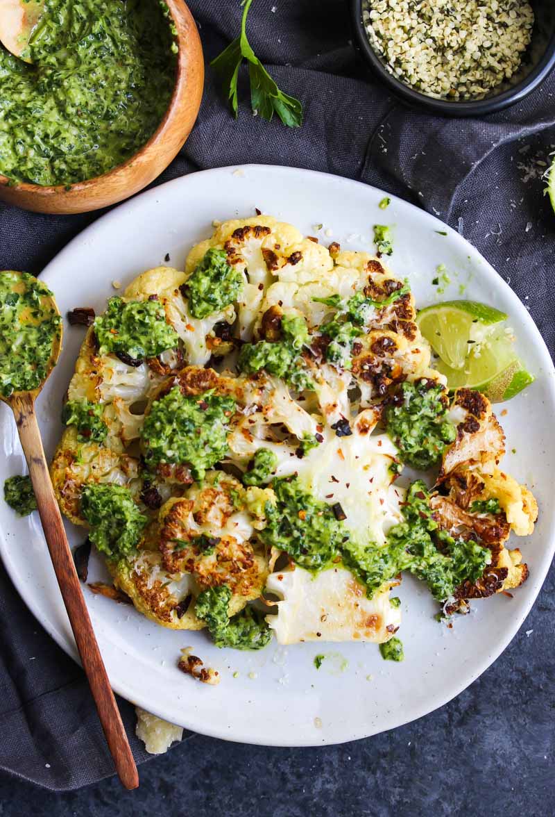 Roasted Cauliflower Steaks with Hemp Chimichurri | dishingouthealth.com