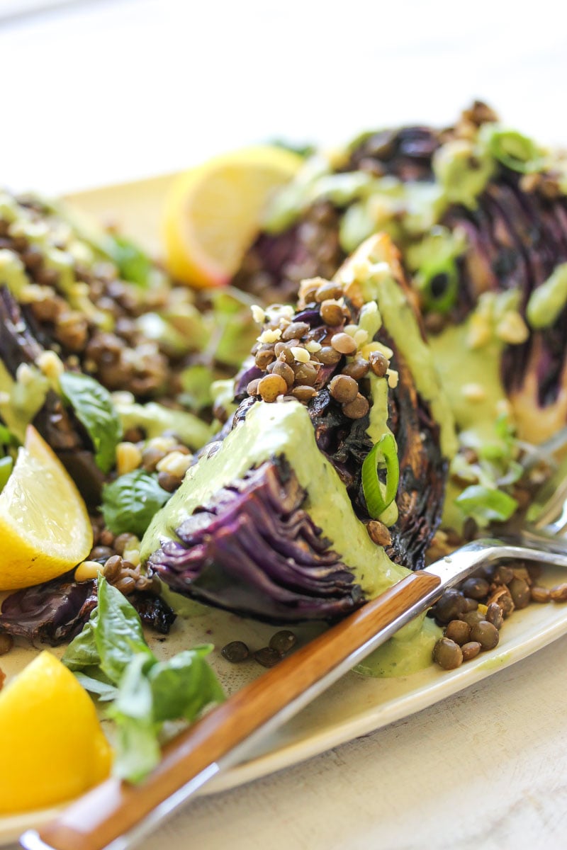 Charred Cabbage with Lentils and Green Tahini | dishingouthealth.com