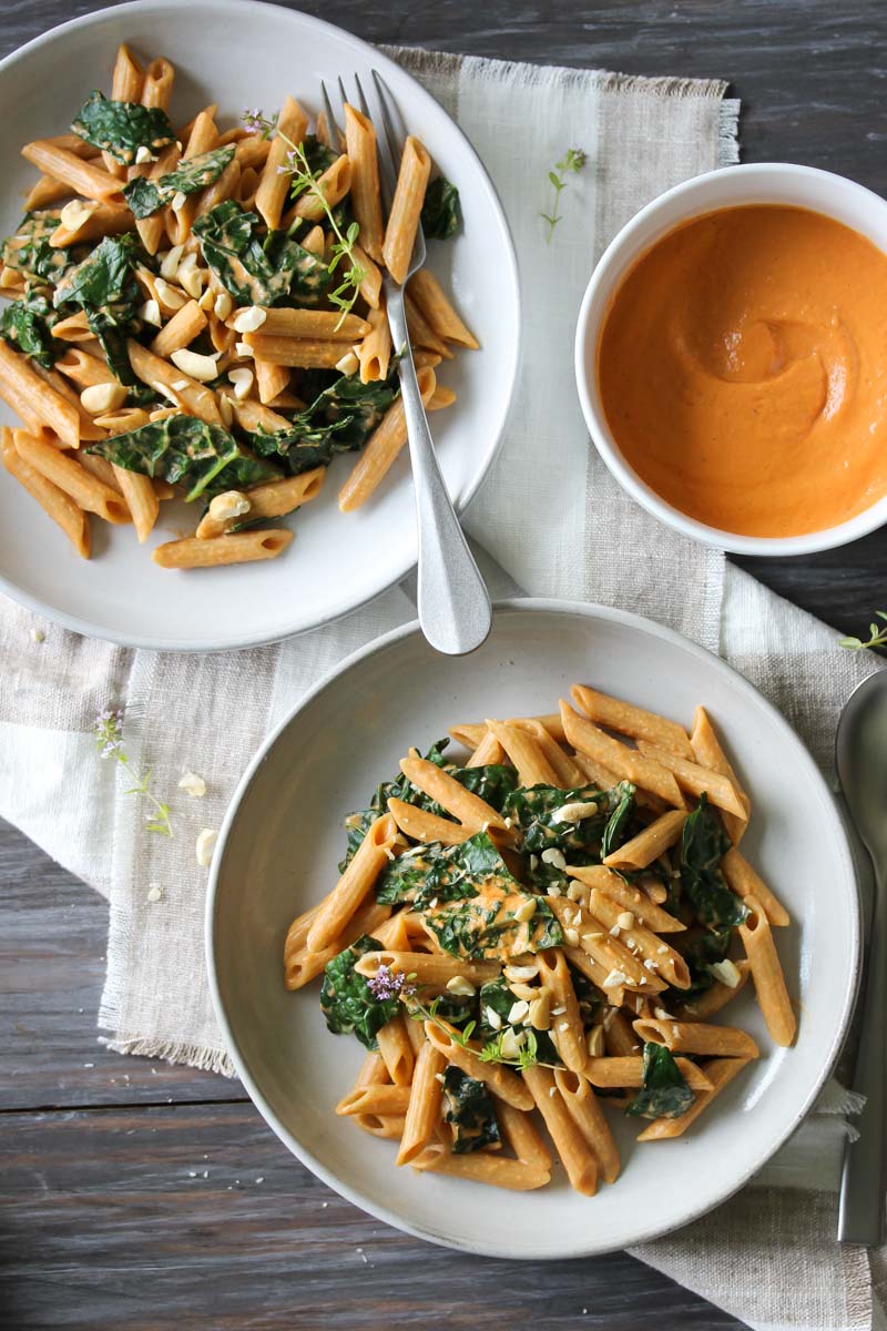 Kale Pasta with Sun-dried Tomato Cashew Sauce (vegan) | dishingouthealth.com