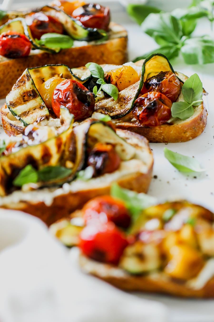Blistered Tomato and Zucchini Tartines with Whipped Feta