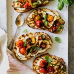 Blistered Tomato and Zucchini Tartines with Whipped Feta