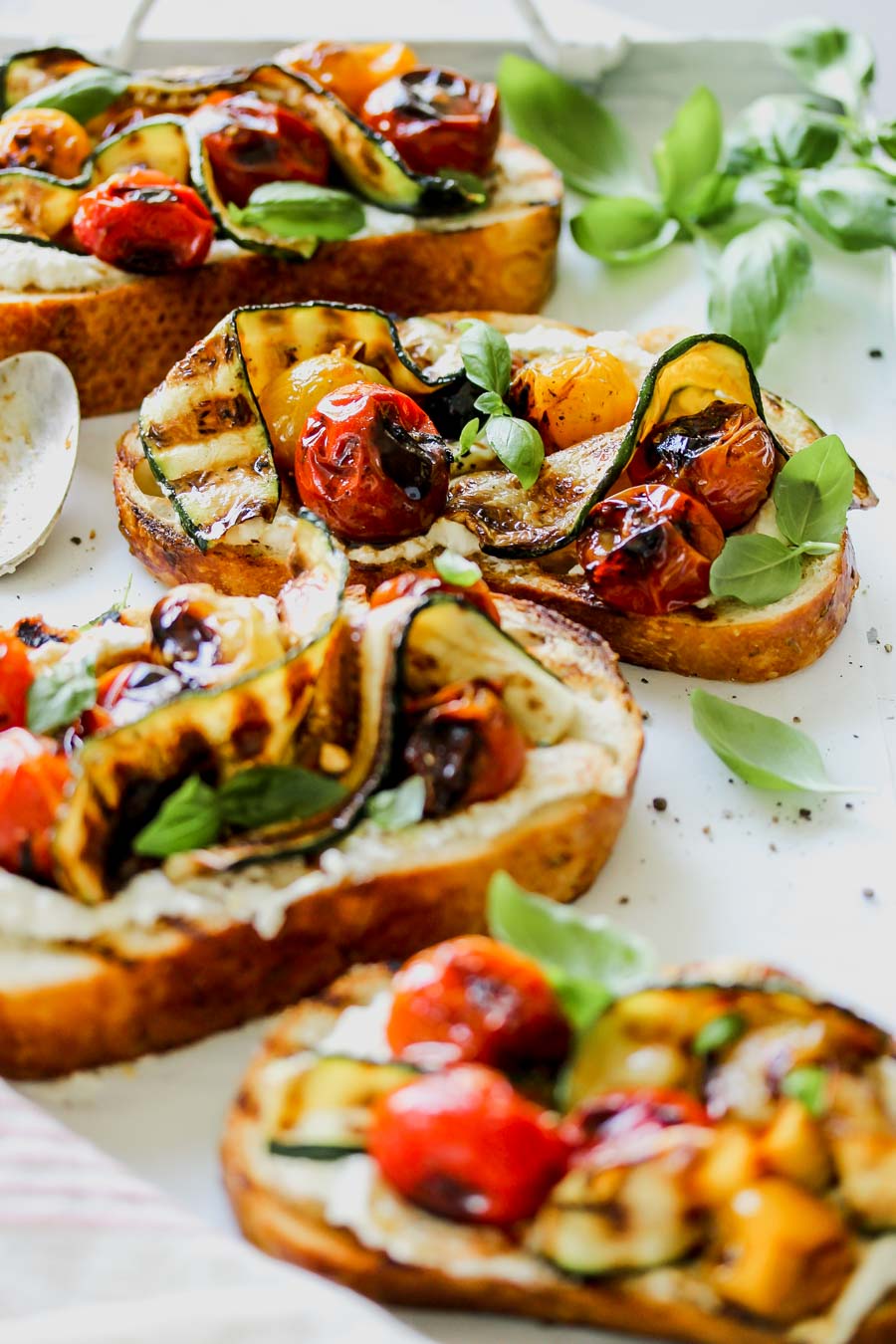 Blistered Tomato and Zucchini Tartines with Whipped Feta