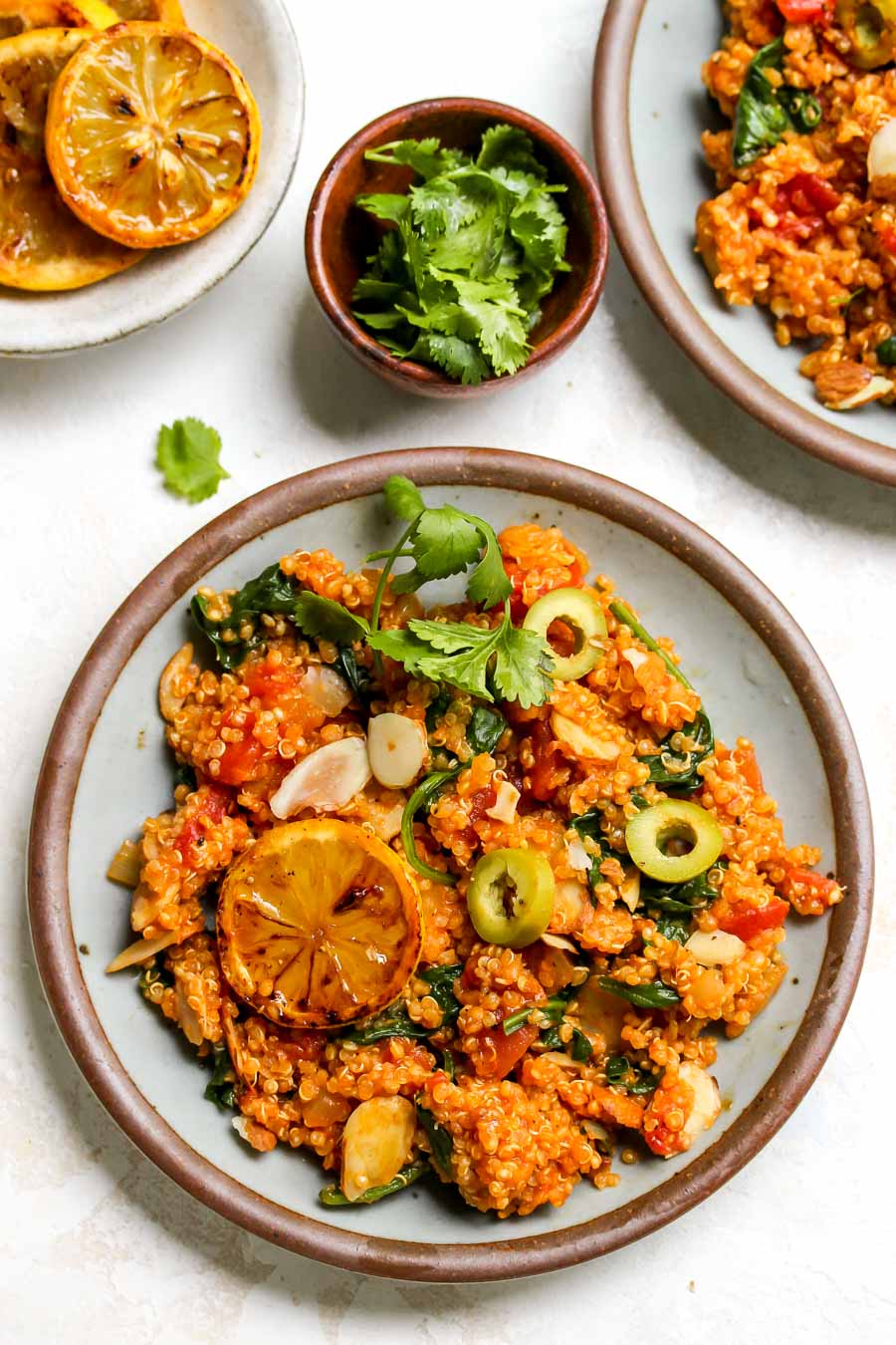 One serving of Moroccan quinoa on a small blue plate.
