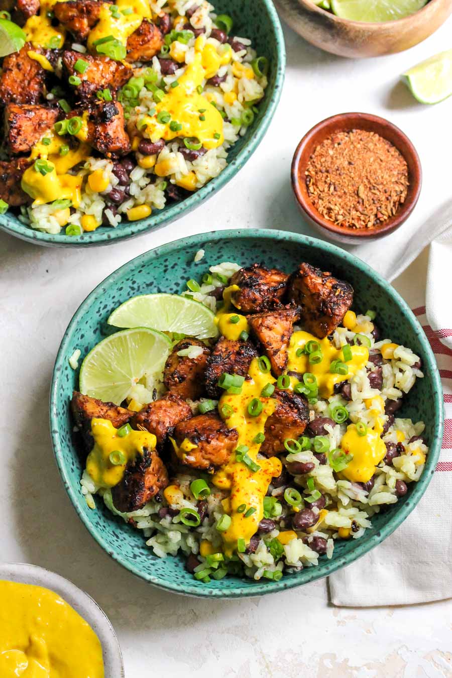 Jerk-spiced tempeh grain bowls with mango-tahini sauce