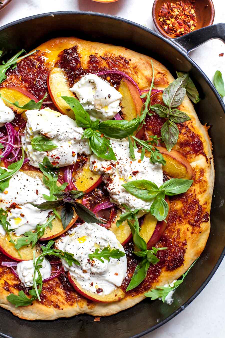 Skillet Pizza with Homemade BBQ Sauce, Peaches, Burrata, and Basil