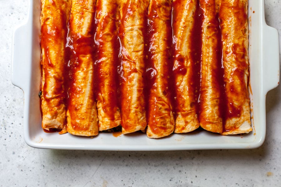 Filled enchiladas with red sauce