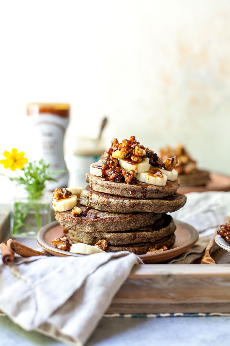 Banana Bread Pancakes made with Buckwheat Flour and Topped with Stovetop Candied Walnuts