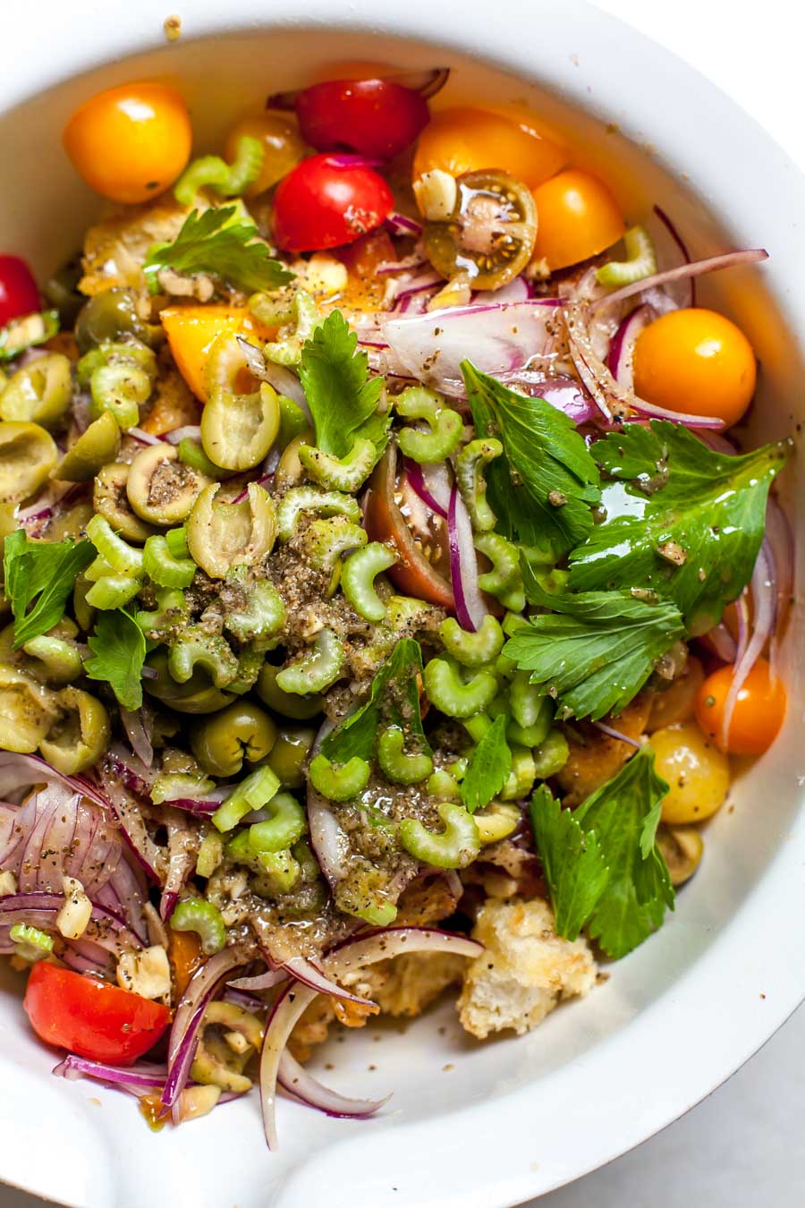 Tomatoes, toasted bread, celery, olives, and onions in a zippy dressing.