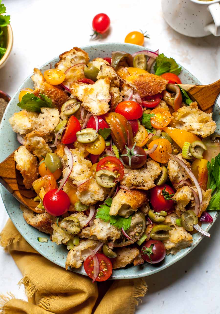 Summer Panzanella Salad with tomatoes, olives, and a Bloody Mary-inspired dressing
