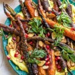 Curried Yogurt Topped with Baked Carrots, Almonds, and Pomegranate