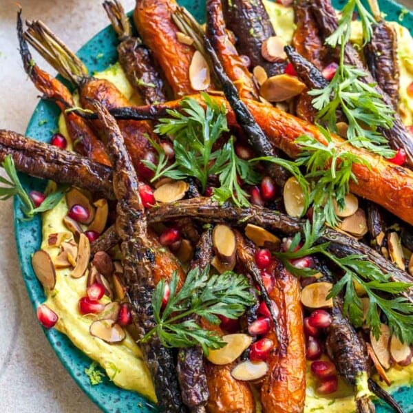 Curried Yogurt Topped with Baked Carrots, Almonds, and Pomegranate