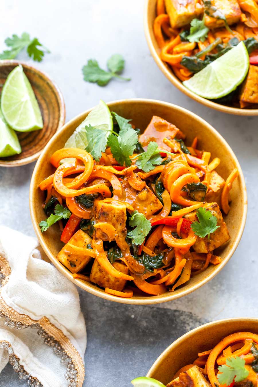 Gluten free sweet potato noodles with Thai curry sauce and crispy tofu