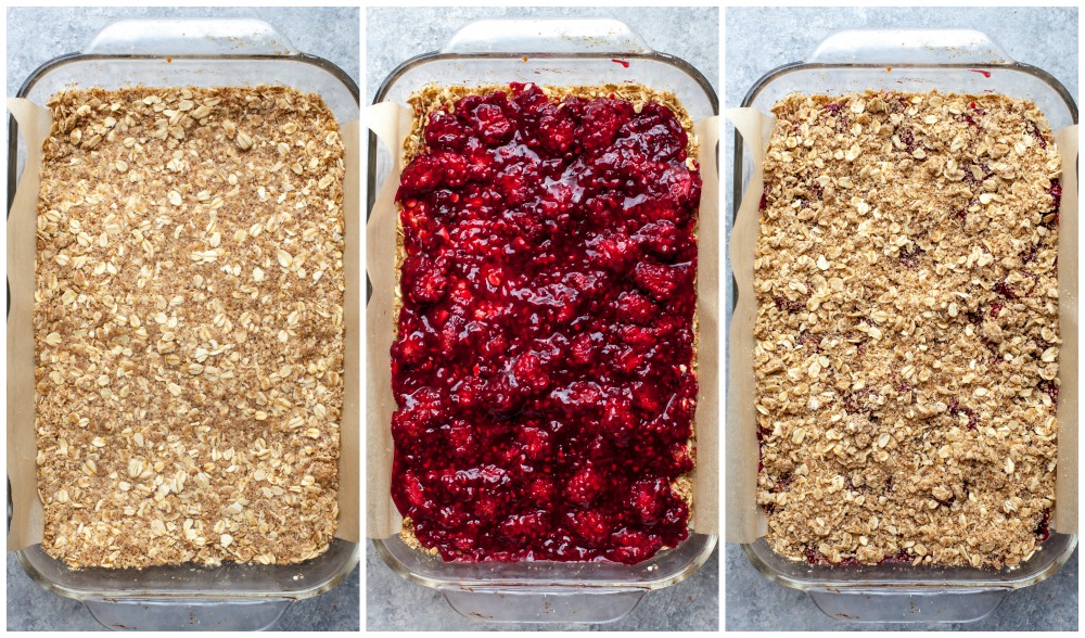Oat crumble and berry mixture being layered in a pan