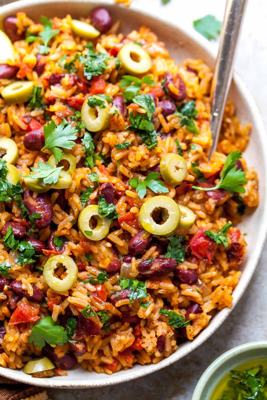 Rice and Beans served with olives and parsley oil
