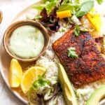 Coconut rice and yogurt sauce shown with salmon