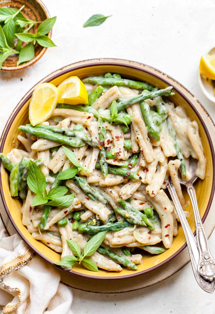 Finished pasta in a bowl with a fork