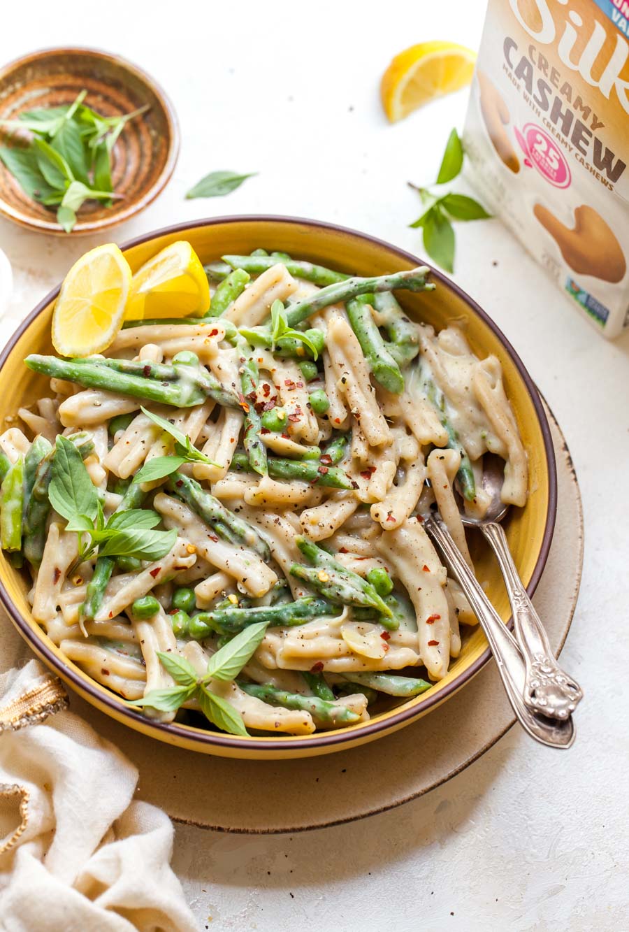 Silk Cashewmilk next to plated pasta