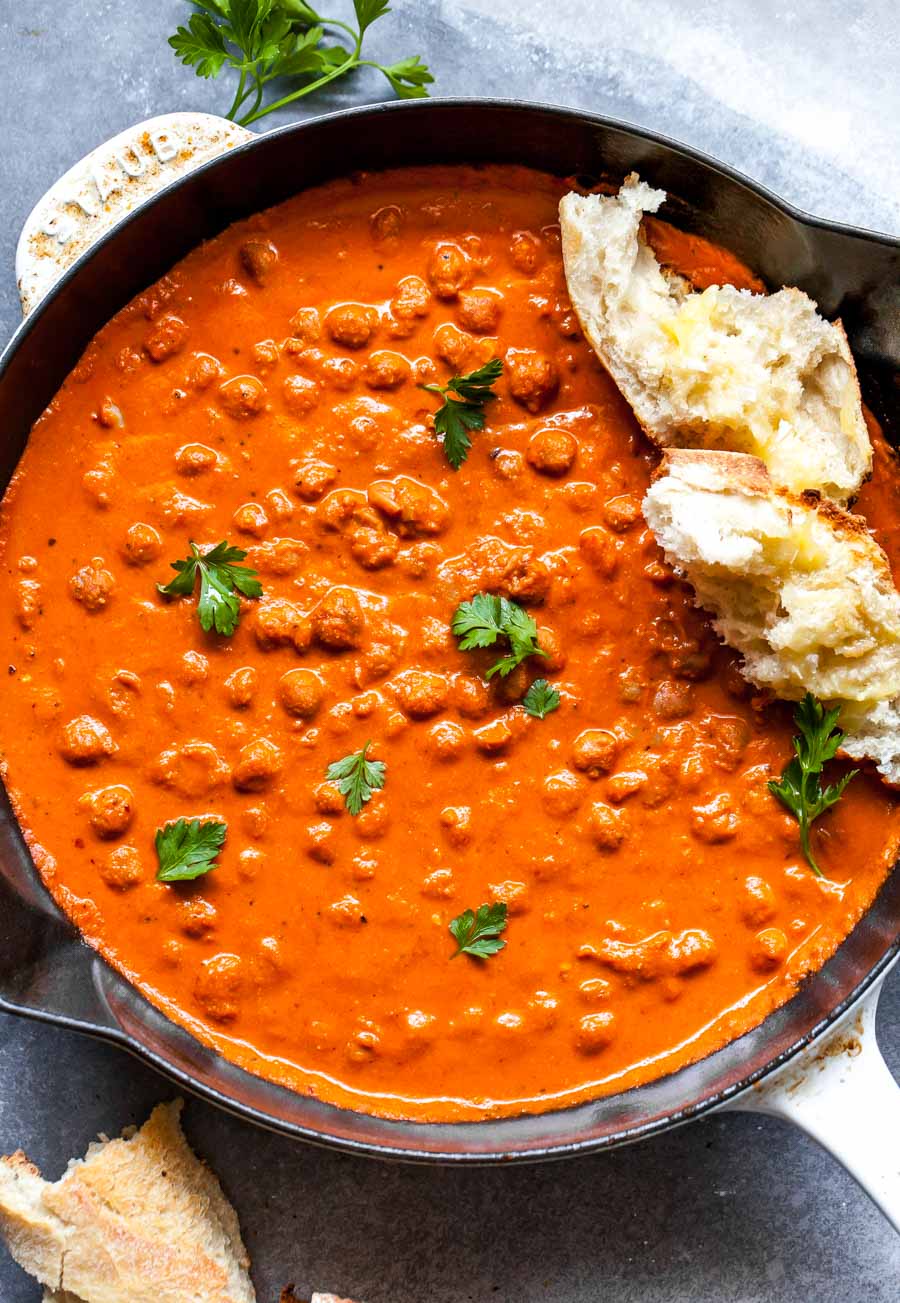 Chickpeas in red pepper sauce in a skillet