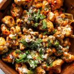 Harissa Roasted Cauliflower and Chickpea Salad with Lemony Tahini