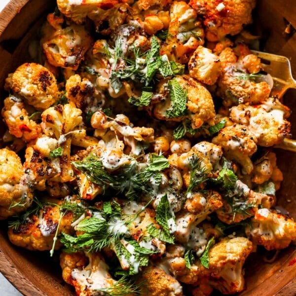 Harissa Roasted Cauliflower and Chickpea Salad with Lemony Tahini