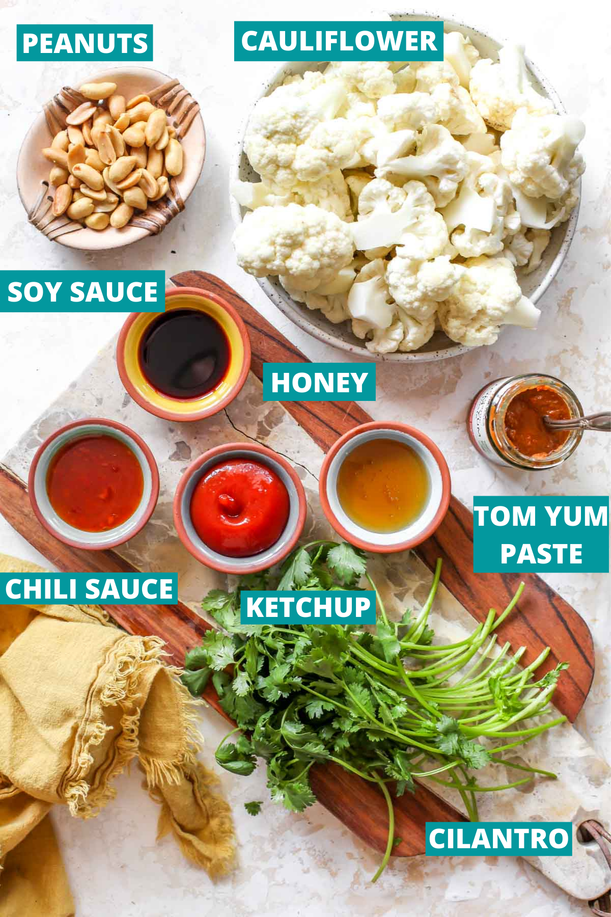 Recipe ingredients in separate bowls with blue labels