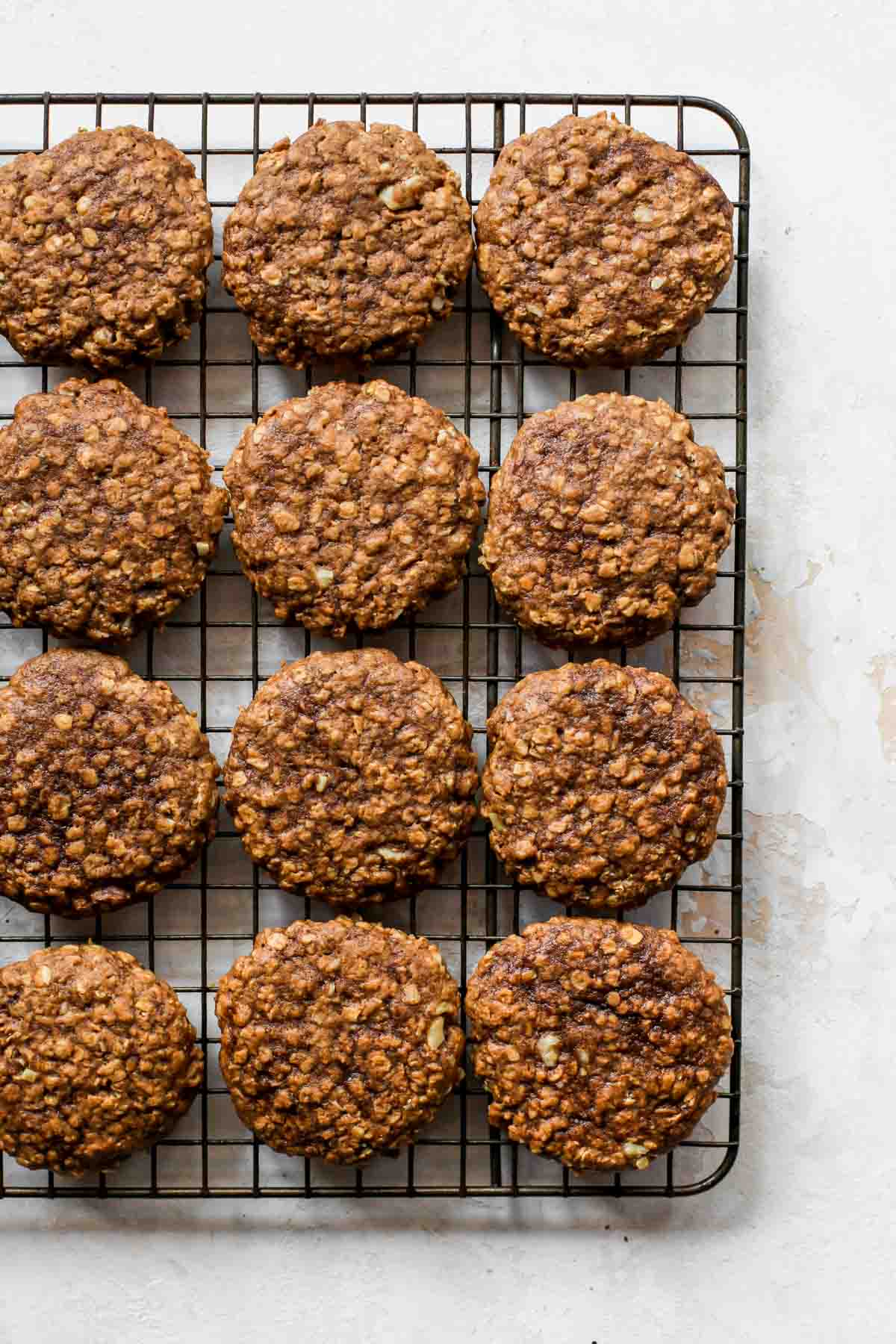 Oatmeal walnut cookies on a cooling rack