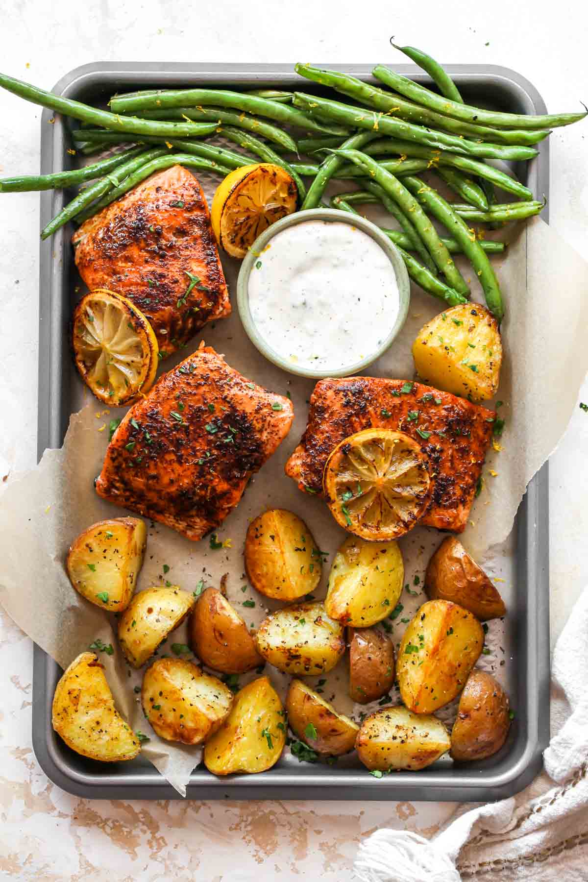 Salmon, potatoes, and green beans on a sheet pan