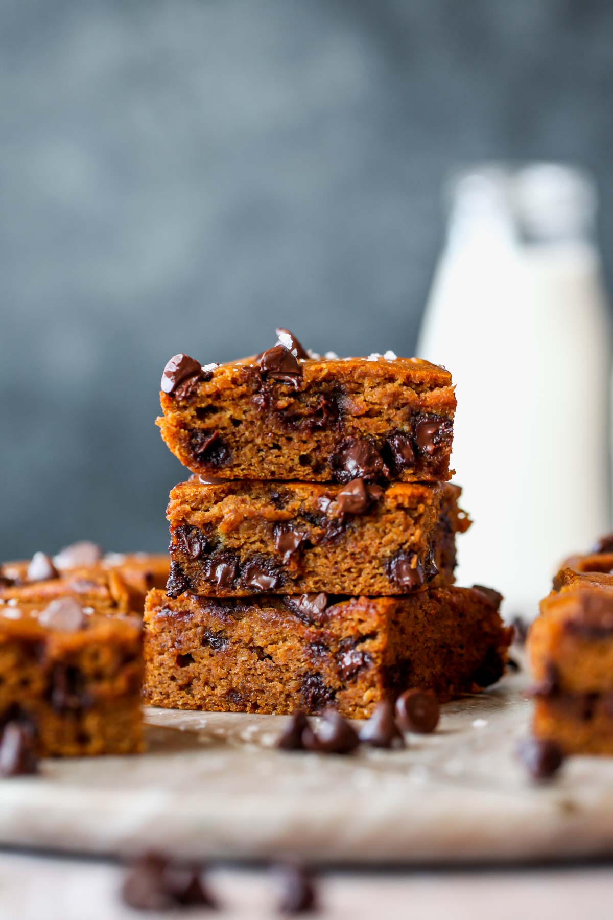 Chocolate chip pumpkin bars stacked on top of one another.
