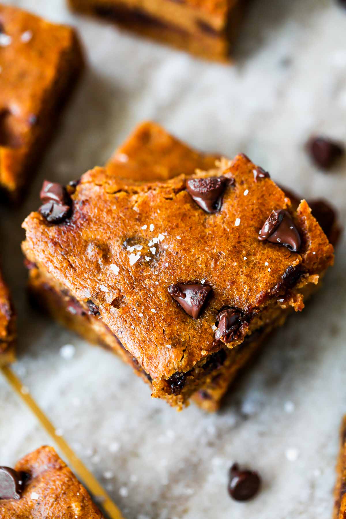 Pumpkin bar with a bite taken out of the corner.