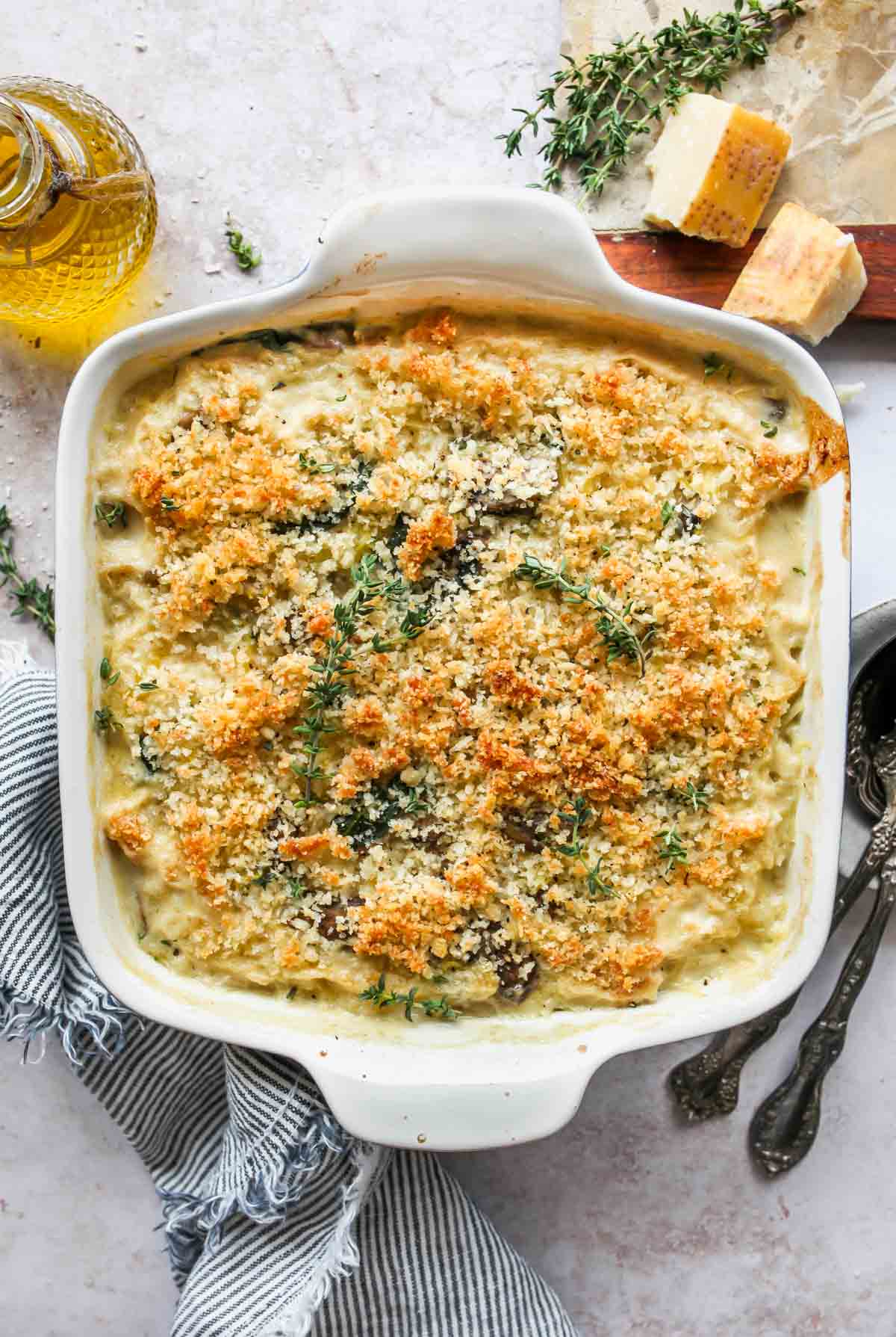 Spaghetti squash casserole after being baked topped with fresh thyme