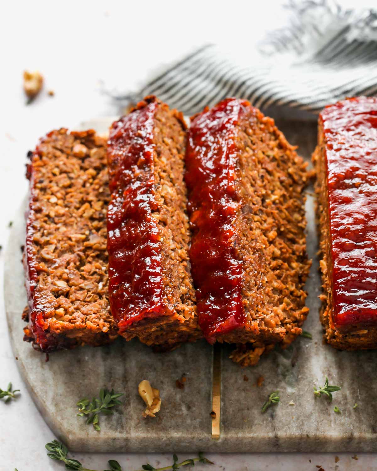 Side angle of sliced vegetarian meatloaf