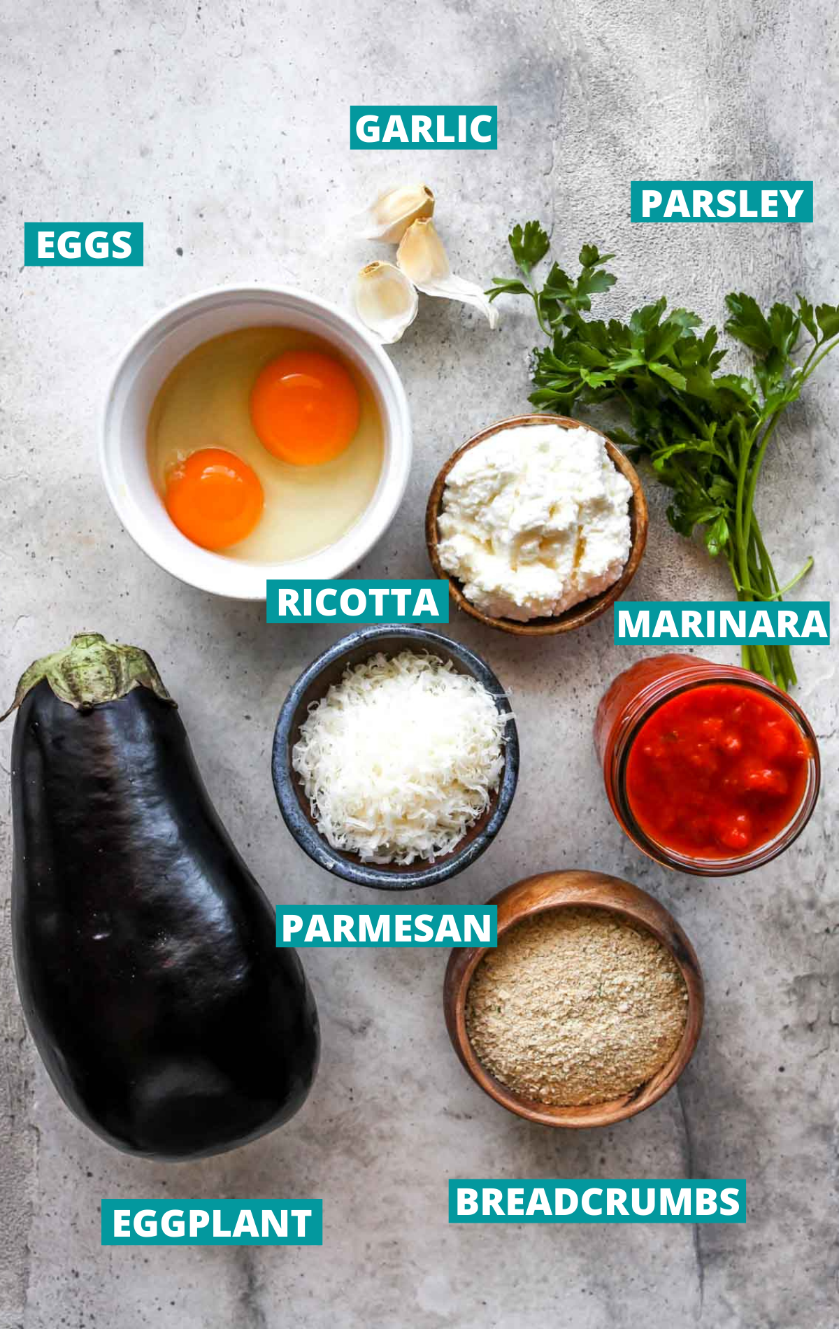 Recipe ingredients in separate bowls with blue labels.