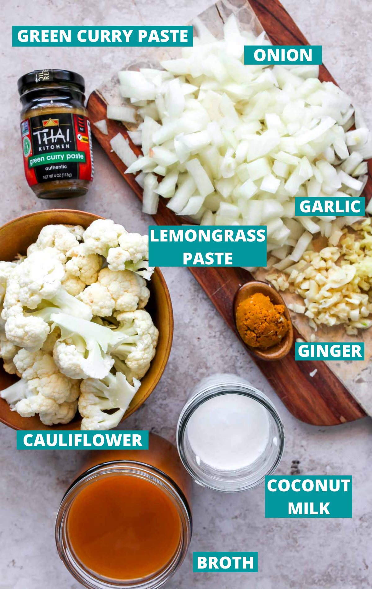 Cauliflower soup ingredients in separate bowls with blue labels.