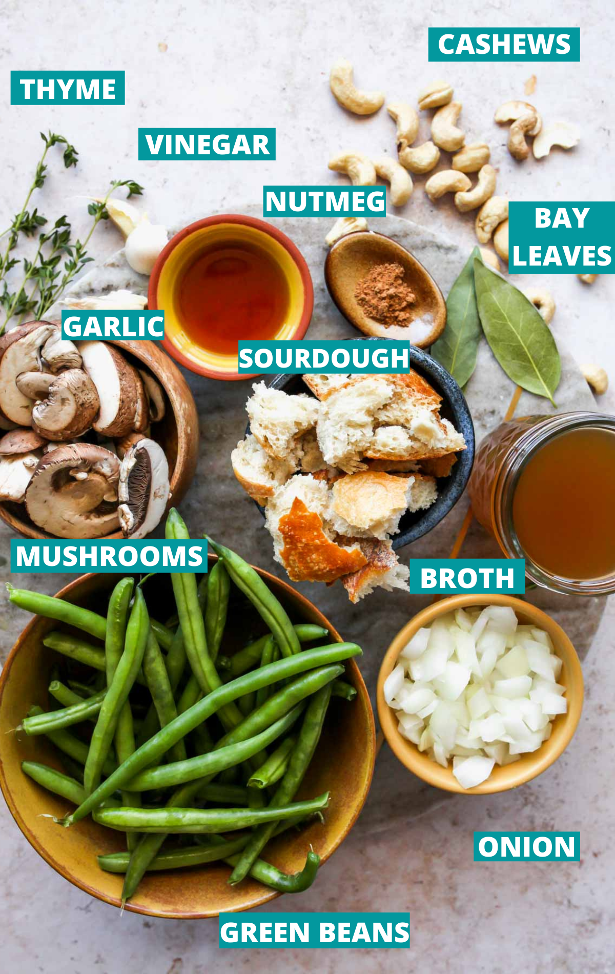 Green bean casserole ingredients in separate bowls with blue labels.