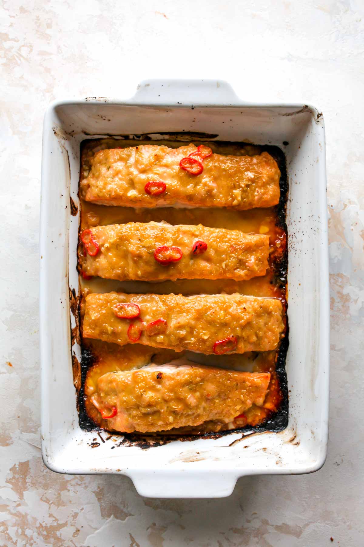Four baked salmon fillets topped with miso marinade