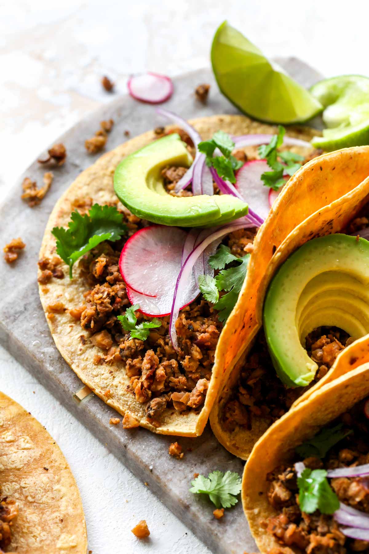 Side view of vegan taco with filling and toppings