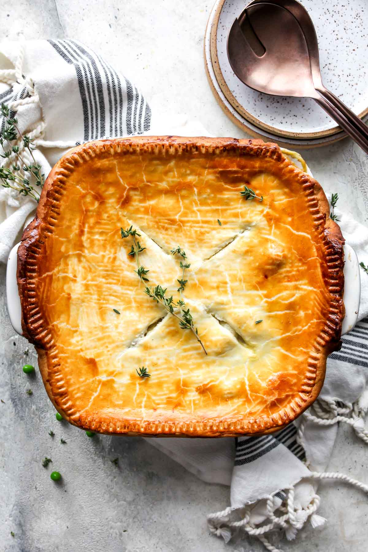 Baked vegetable pot pie topped with fresh thyme
